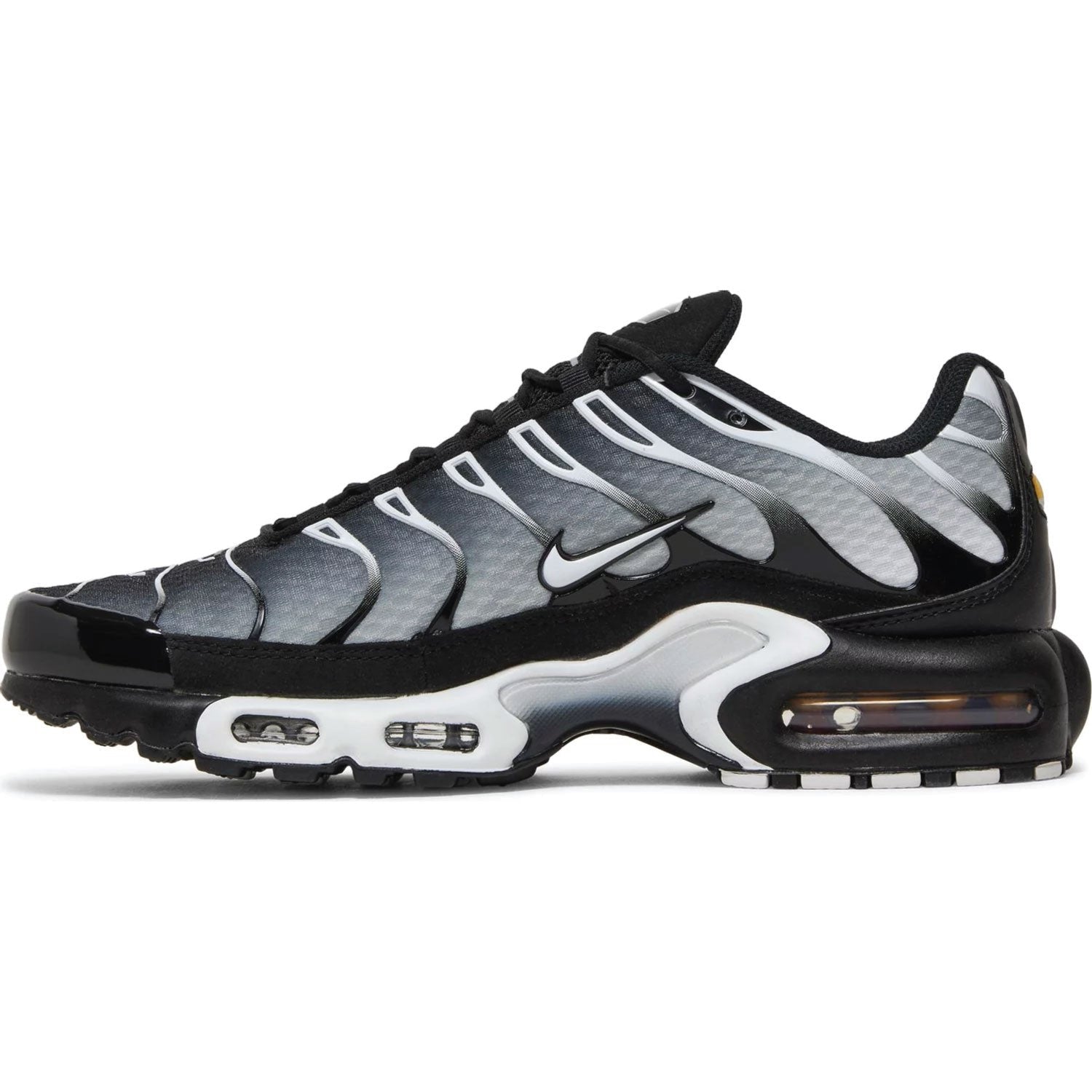 Nike Air Max Plus 'Black Metallic Silver' – Sleek black sneakers with metallic silver accents, Tuned Air cushioning, and a wavy design for ultimate comfort and style.